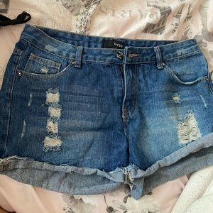 Slightly distressed dark denim jean shorts